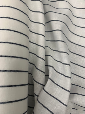White linen cotton fabric with black stripes in one inch increments horizontally