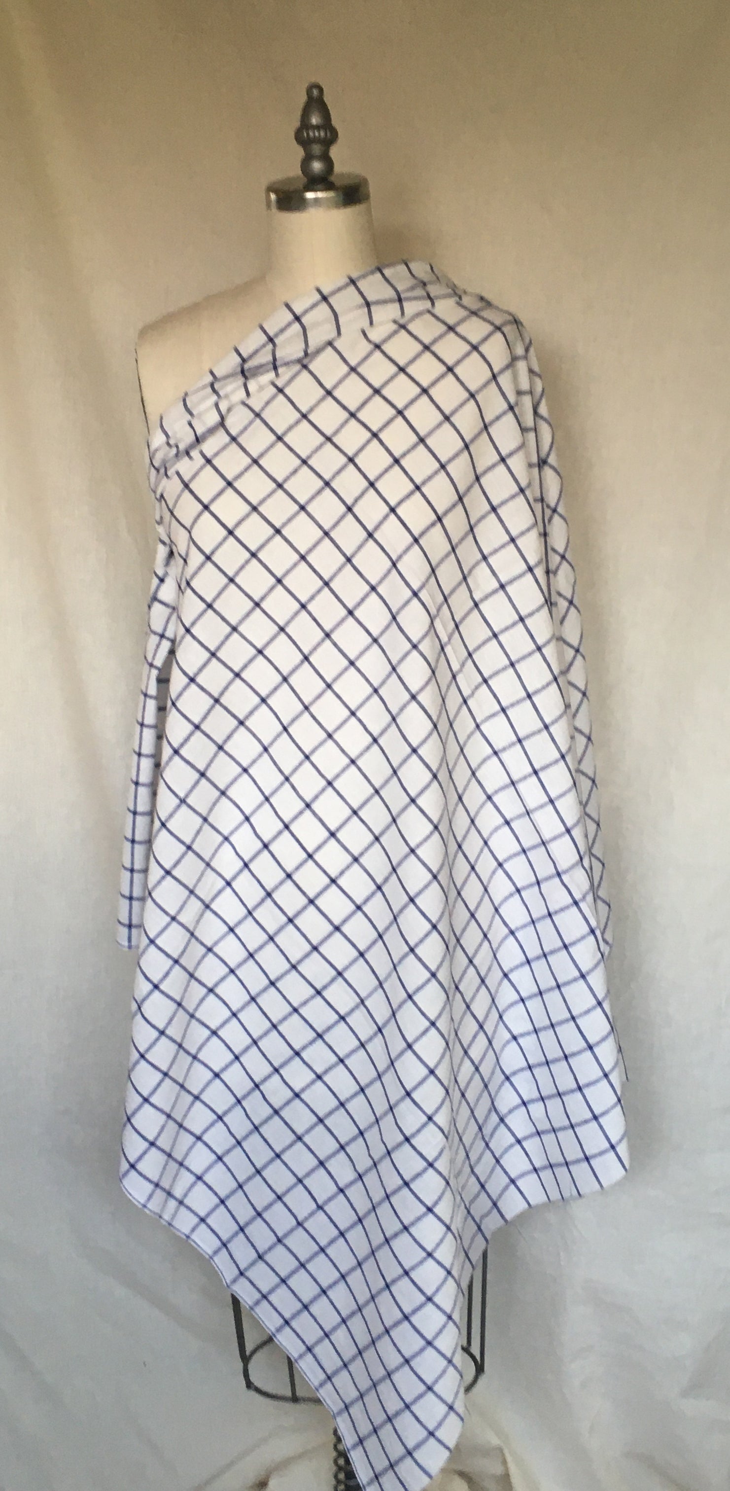 Photo of window pane fabric bias draped on a dress form