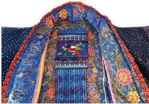inside of neckline of a blue and colorful jacket
