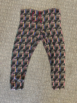multicolored pants on a grey floor