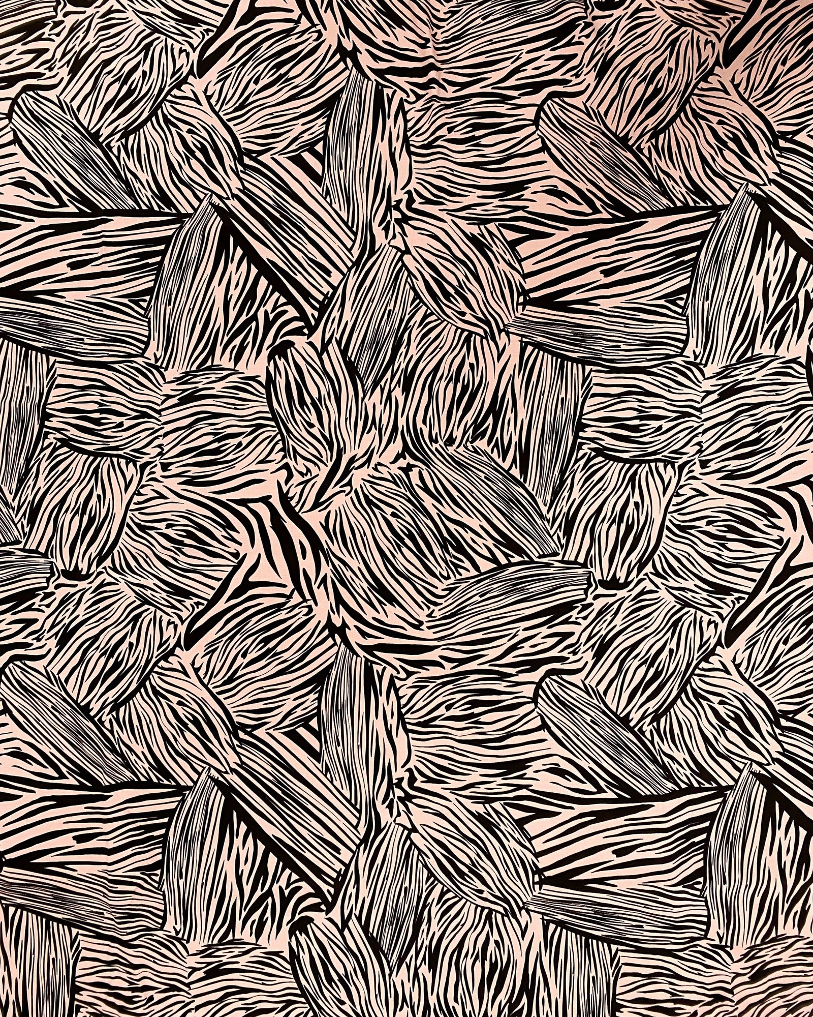 a roll of marine blue cotton jacquard fabric on a light grey background