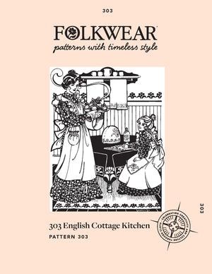 front cover photo of the  English Cottage Kitchen in a black and white drawing. A woman standing on the left wearing the apron with a floral dress underneath. She is holding biscuits in the biscuit cozy and wearing the oven mittens on her hands. In the center is a table with a  black table cloth with the egg cozy and tea cover as well as the placemats on the table. a young girl is sitting at the table on the right wearing the same apron in a child's size as well as a floral dress.