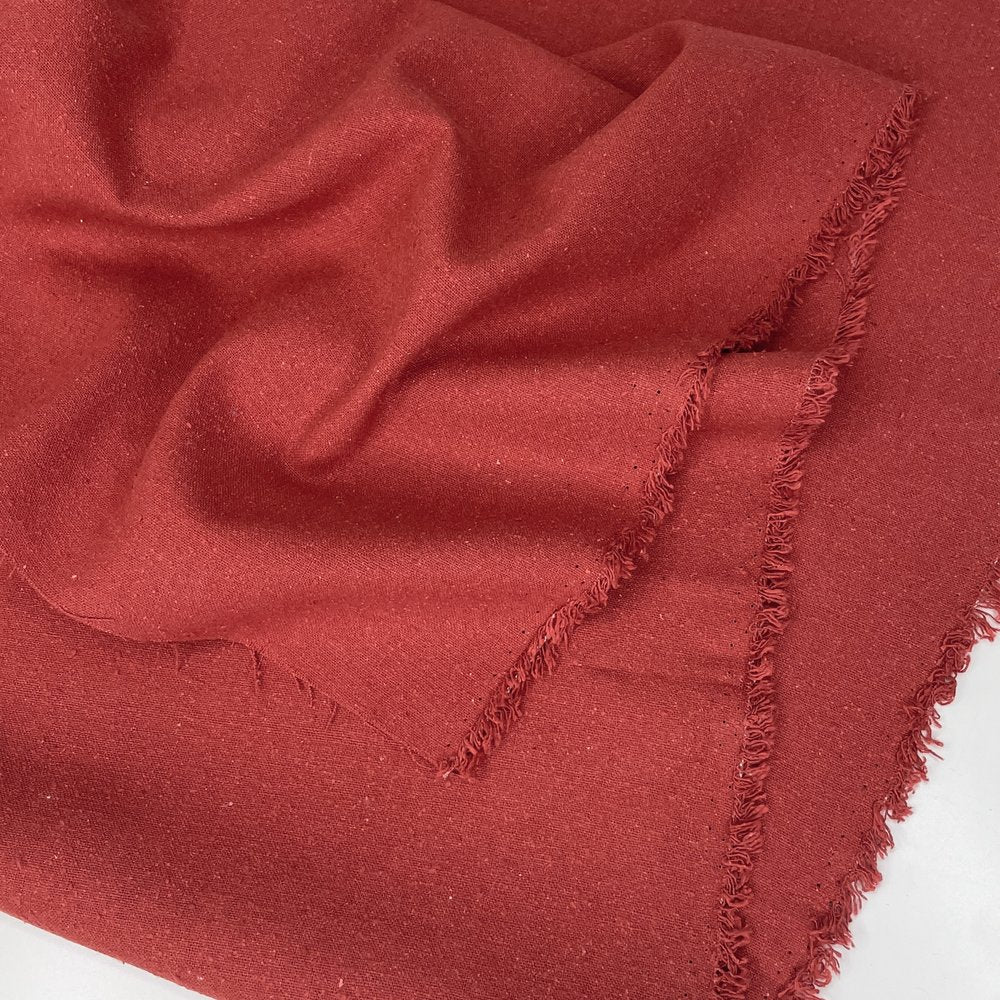 raw silk in a red earth color