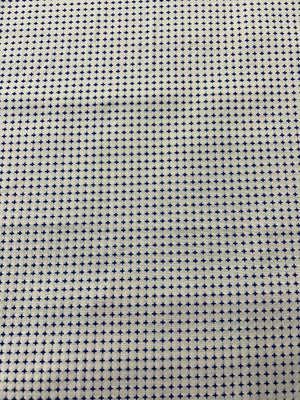 Textile fabric with a small star pattern on a neutral background