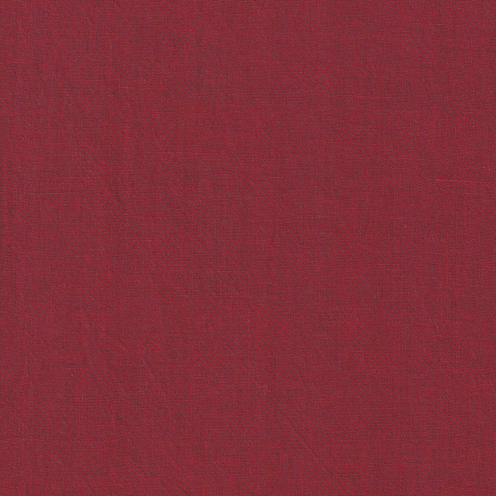 Close-up of red fabric on a white background
