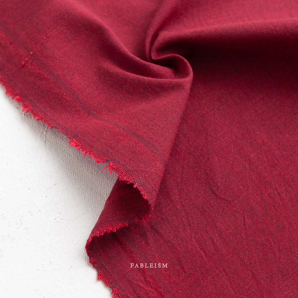 Close-up of red fabric on a white background