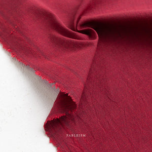 Close-up of red fabric on a white background