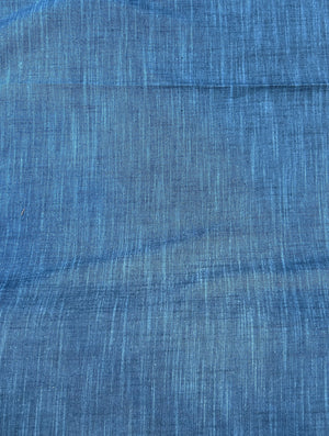 Handloom cotton fabric in a bright blue color.