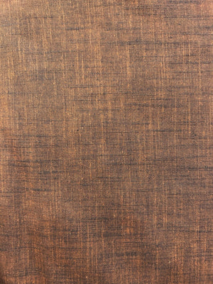 Handloom cotton fabric in a rich brown color.