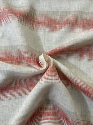 Red and white stripe linen fabric in a swirl.