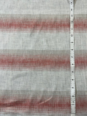 Red and white stripe linen fabric with a white measuring tap on the right.