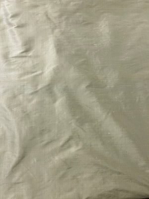 Close-up of a textured silk dupioni fabric surface