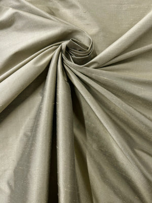 Close-up of swirled beige fabric
