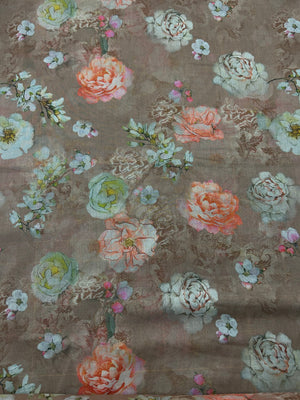 This is a cotton voile, with large white and peach blooming peonies mixed with delicate cherry blossom-like sprigs on a pale light brown background
