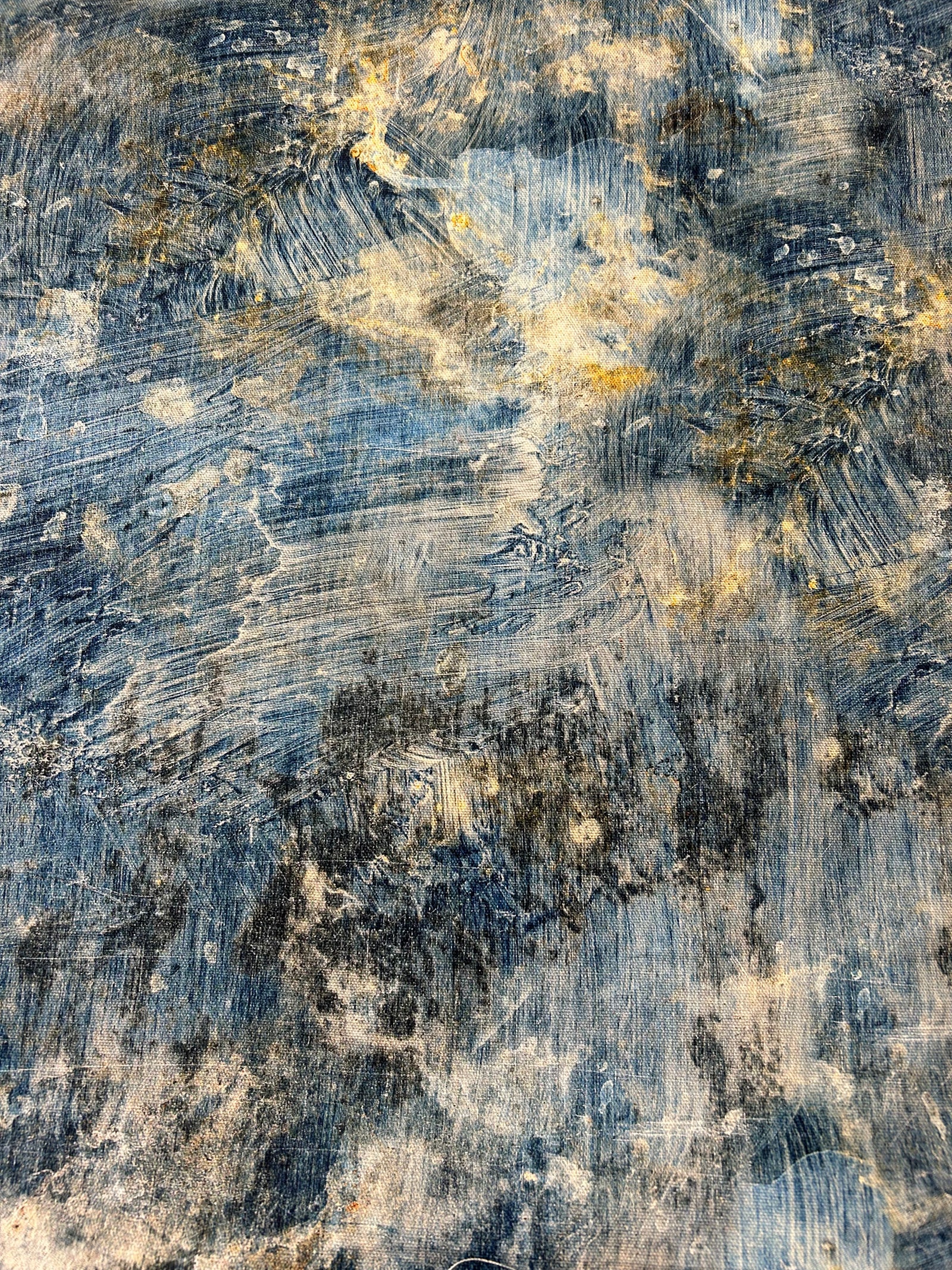Blue paint brush stroke fabric with hints of white and yellow.