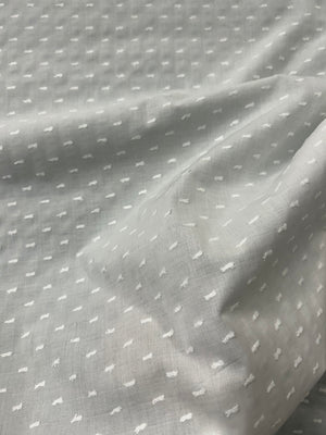 White swiss dot fabric.