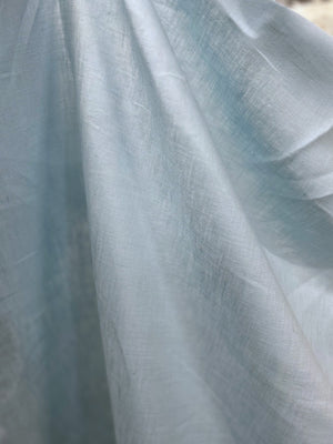 buttery pale aqua mid-weight (handkerchief) linen draped.