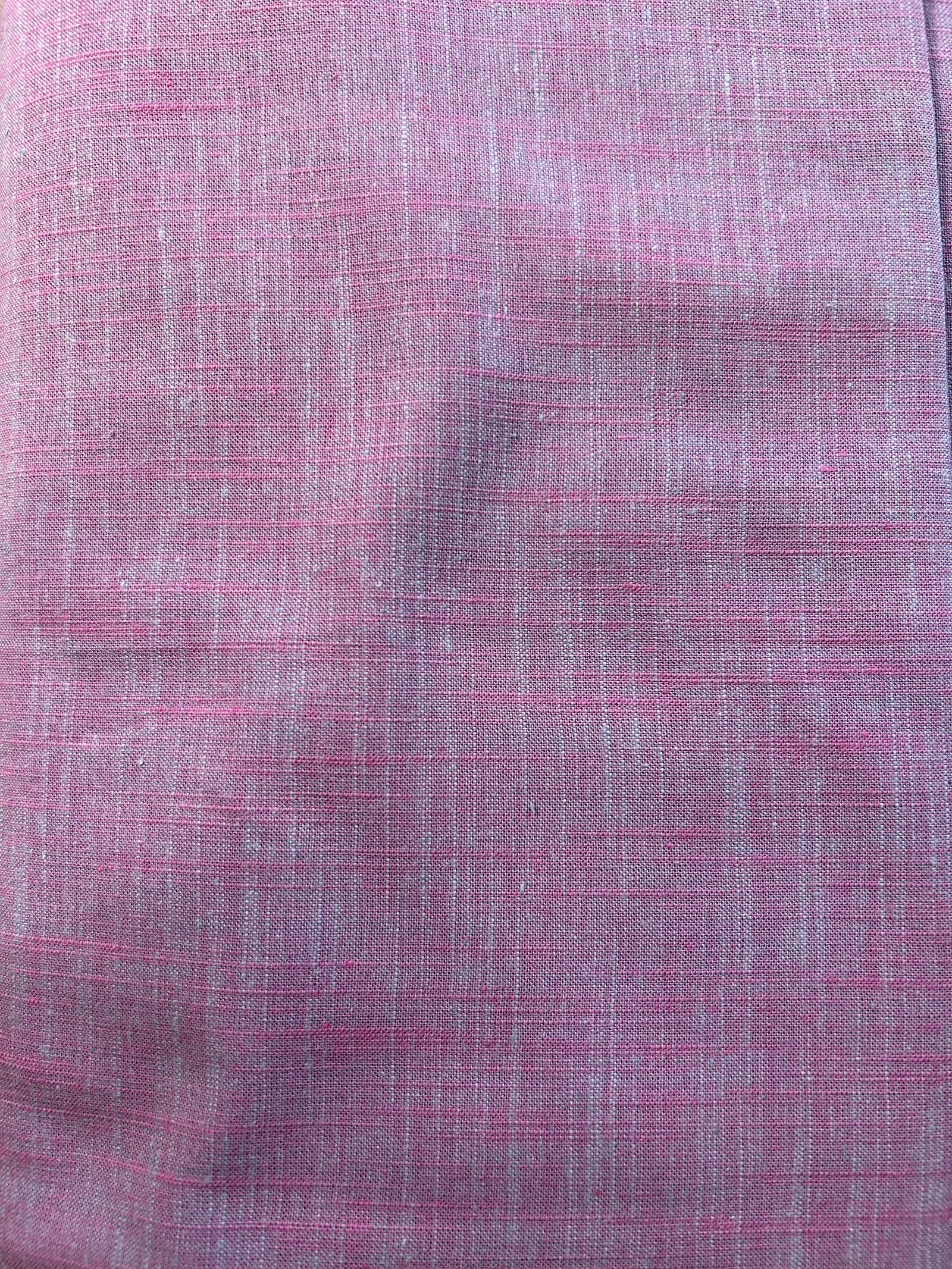 Handloom cotton fabric in a light purple color.