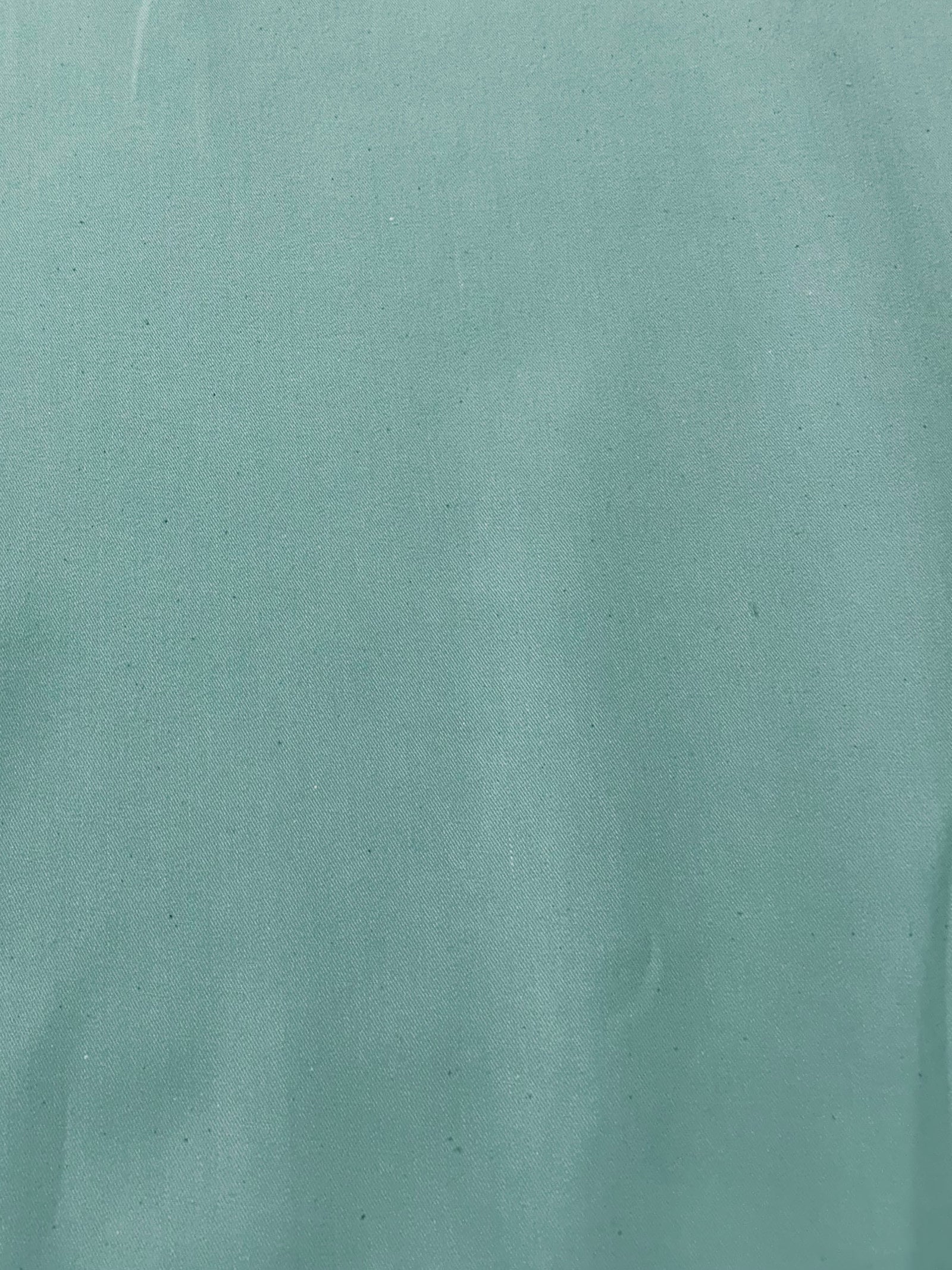 Aqua cotton denim fabric.