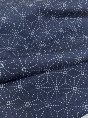 Navy fabric with white geometric sashiko pattern
