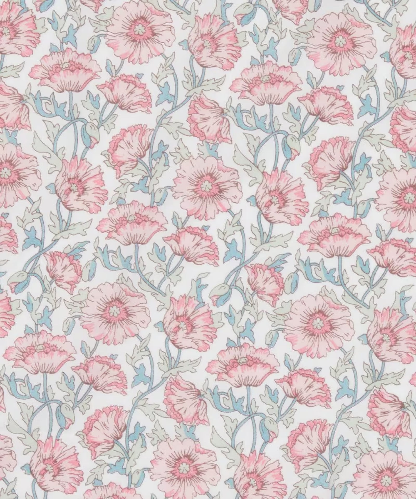 Liberty of London cotton tana lawn in  a beautiful, vibrant print of pink poppies with blue stems on a white background. With a light brown ruler on top.