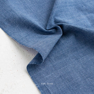 Close-up of blue fabric  on a light background