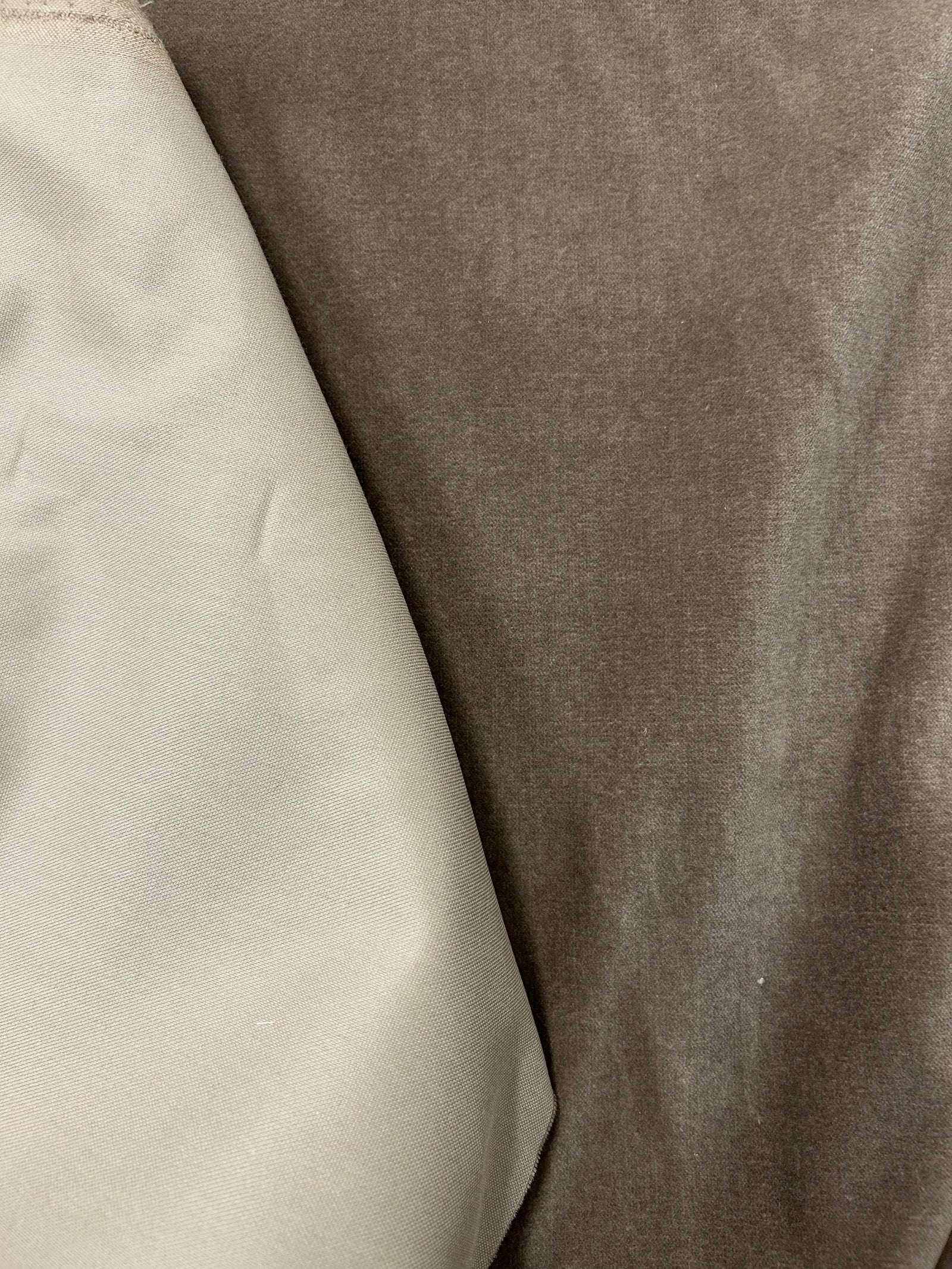 Close up of a draped mocha brown velvet.