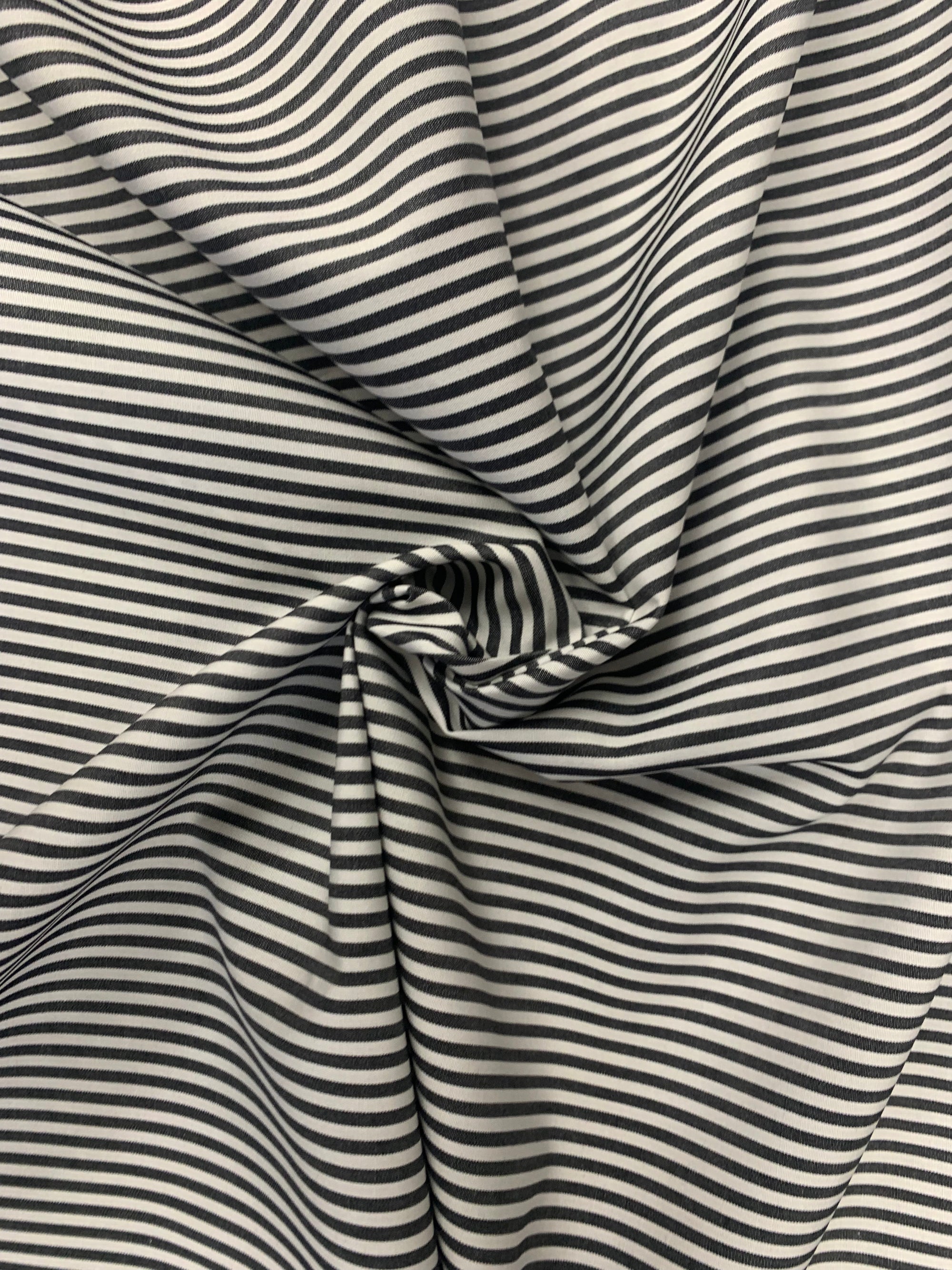 Fabric in a cotton shirting in black and white stripe