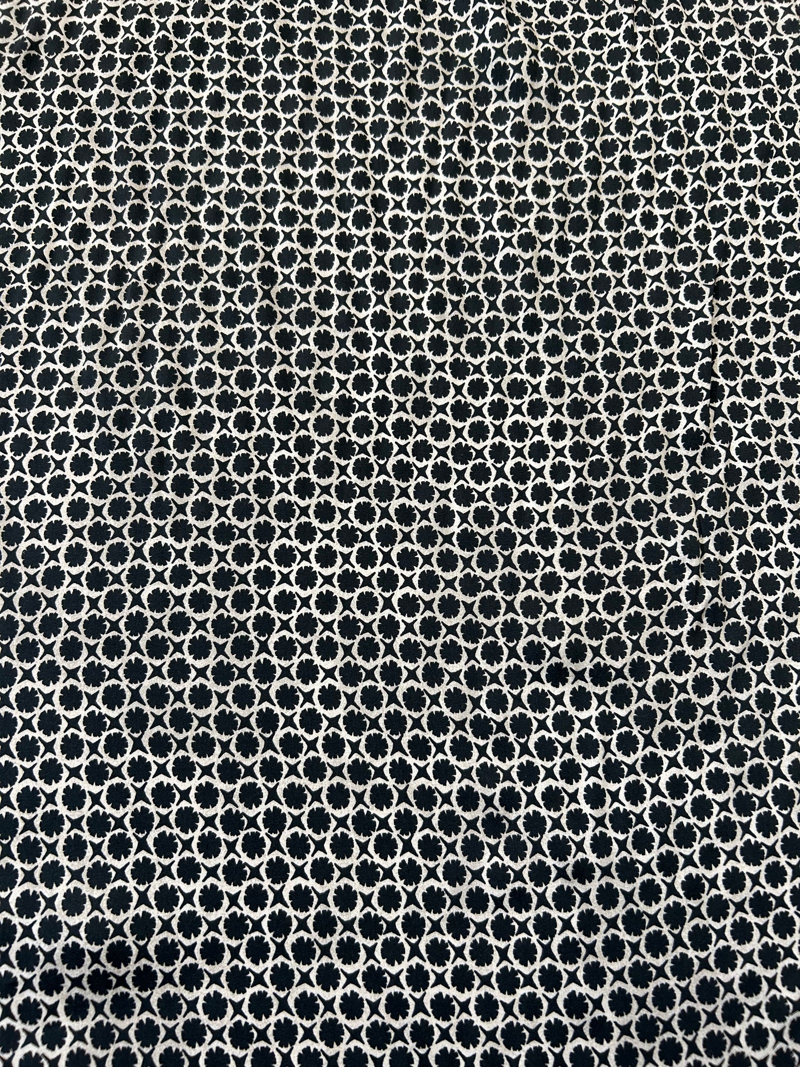 vintage-style, black and tan geometric print, made of viscose with a satin finish.