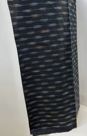 Textured navy fabric with a pattern of small, evenly spaced lines on a dark background