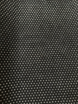 Black fabric with small white floral pattern