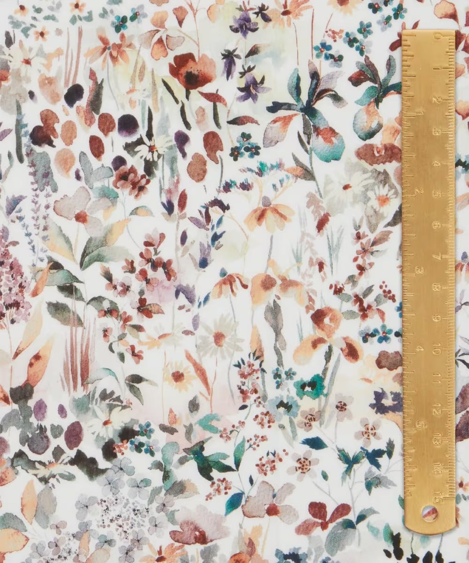  liberty of london fabric, cotton tana lawn, with a soft print of watercolored irises, poppies, and daisies.