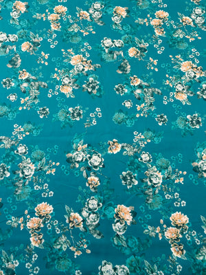Cotton fabric with a Peach Floral pattern on a teal background.