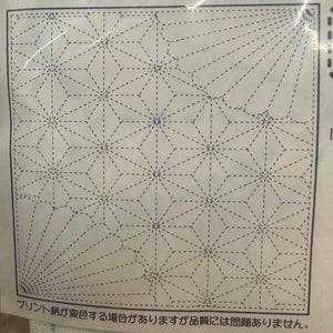 Sheet with fan and hemp leaf pattern on a white background