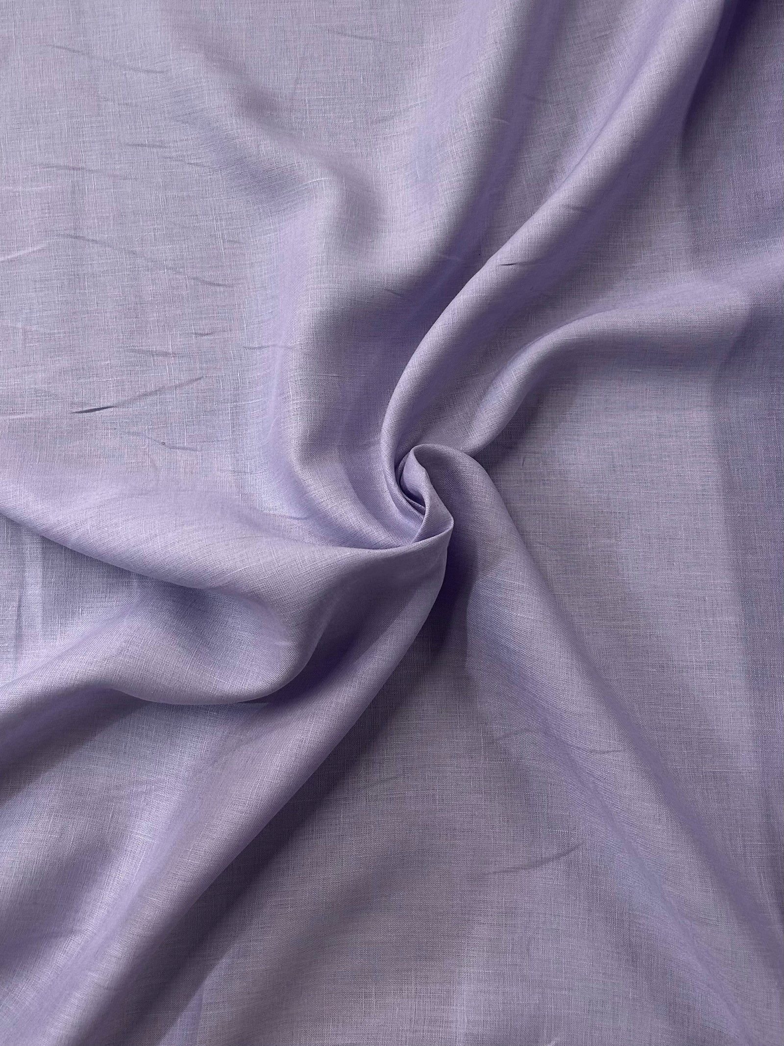 Close-up of purple fabric with folds