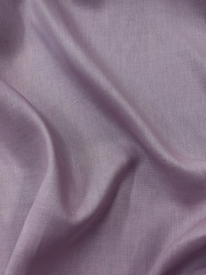 Close up of a dusty pink linen fabric.