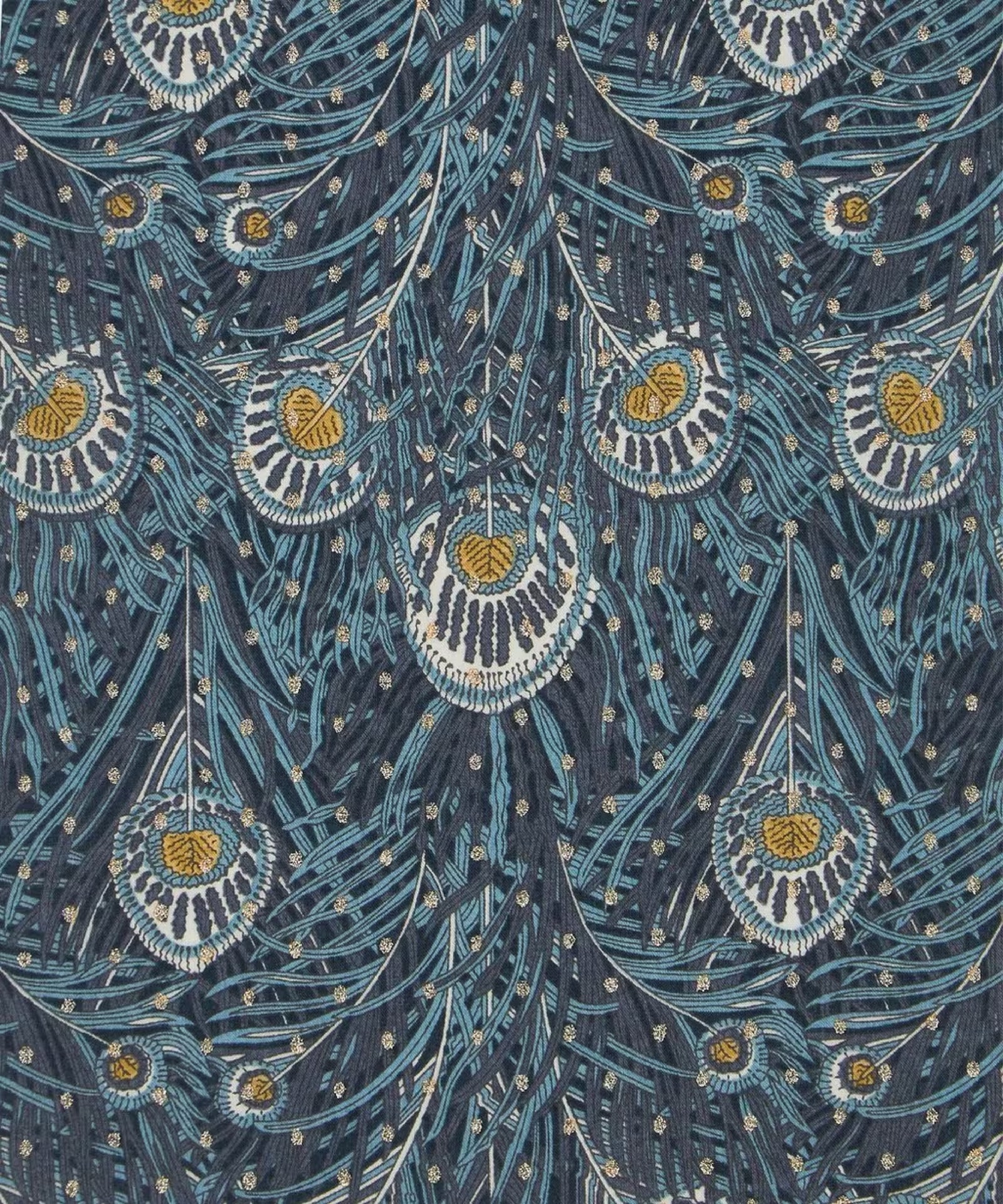 Close up of a royal, vibrant fabric has a quality print of peacock feathers dark blue with a mustard eye.