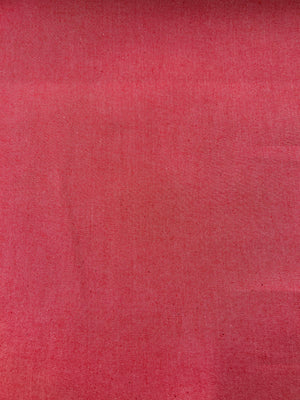 Bright red cotton denim fabric.
