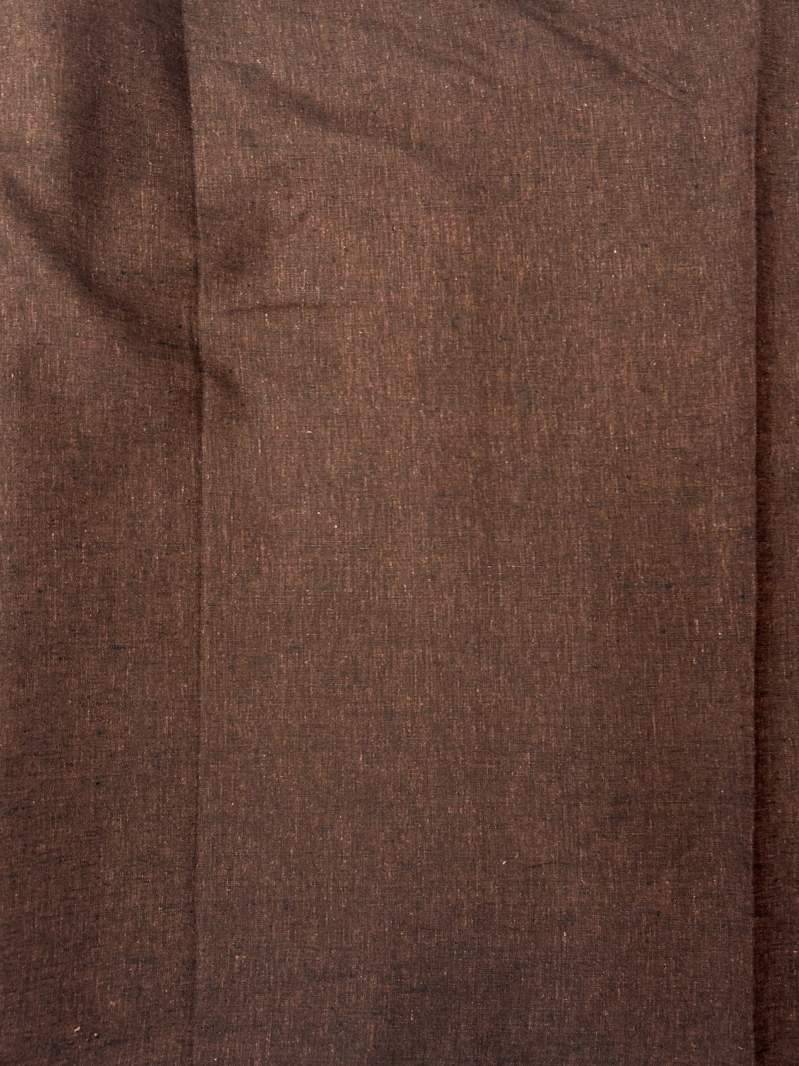 medium-weight linen is woven with deep rust brown and black threads laid flat.