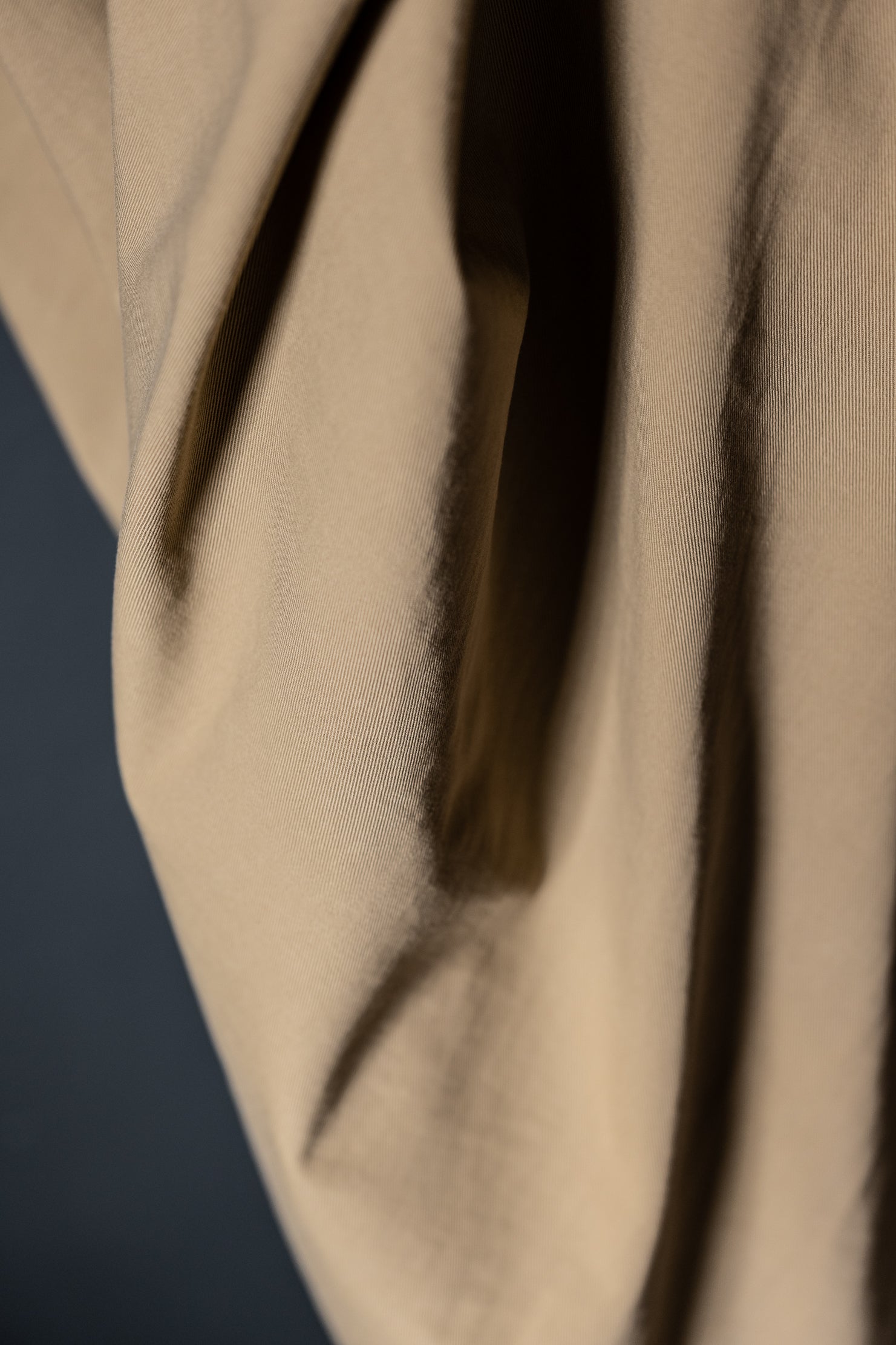 close up of cotton sanded twill fabric in a dark beige color Sand.