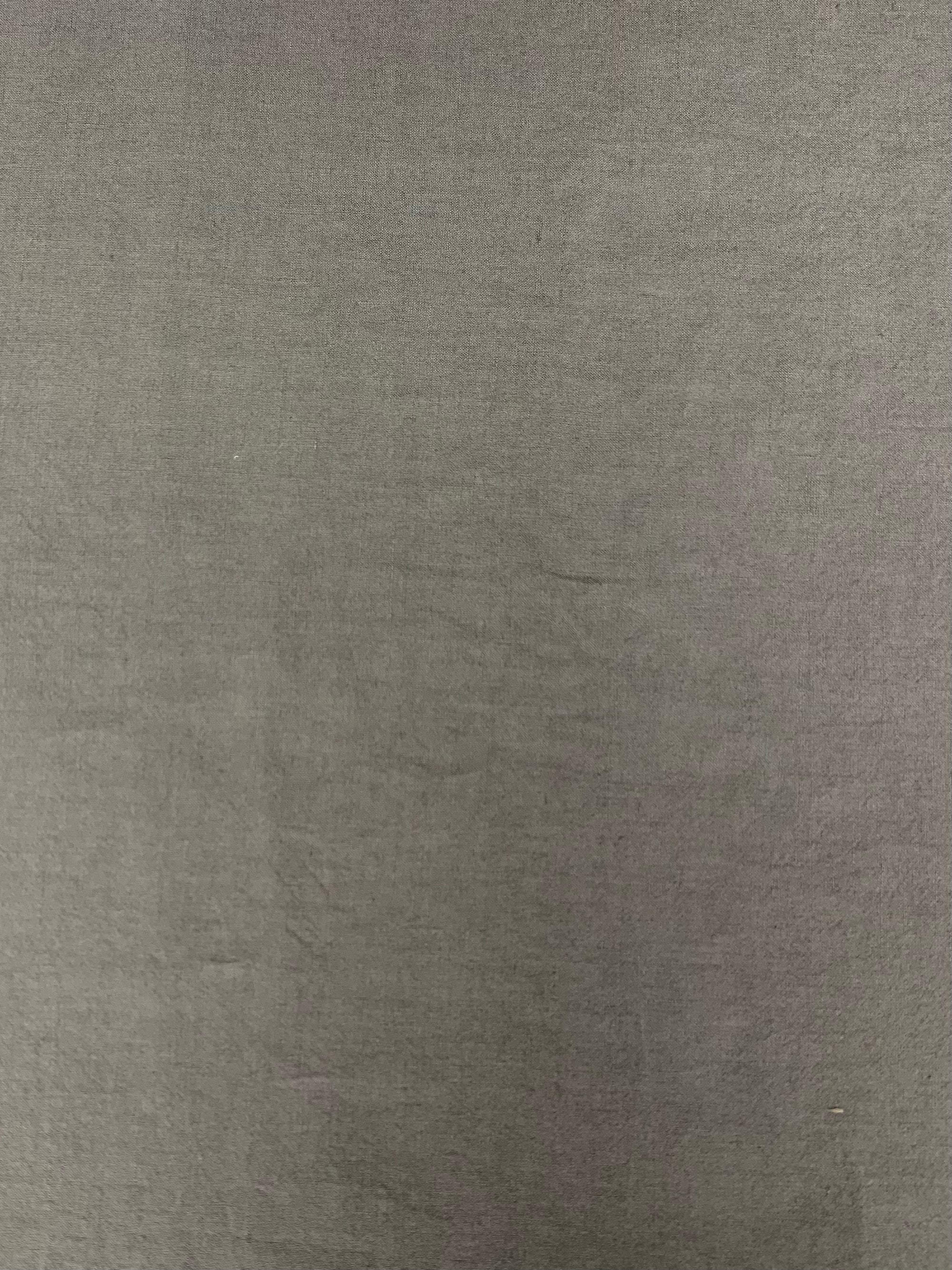  mediumweight linen fabric is a opaque warm gray stone color