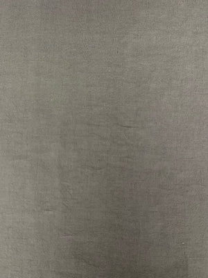  mediumweight linen fabric is a opaque warm gray stone color