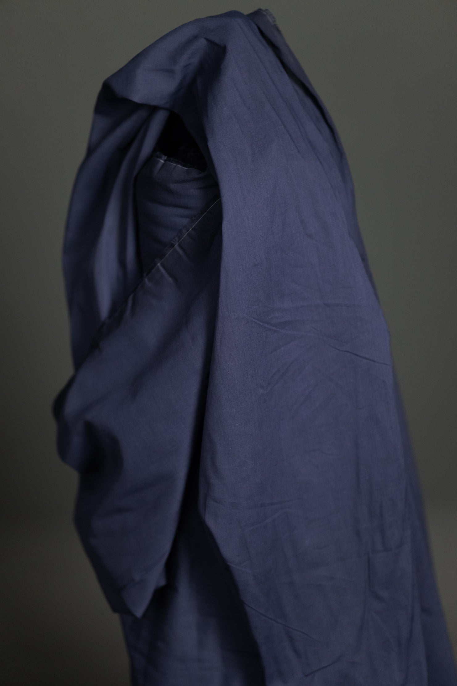 navy blue cotton voile on a dark grey background