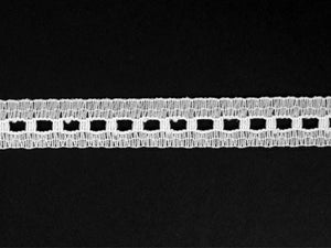 white beading lace trim on black background