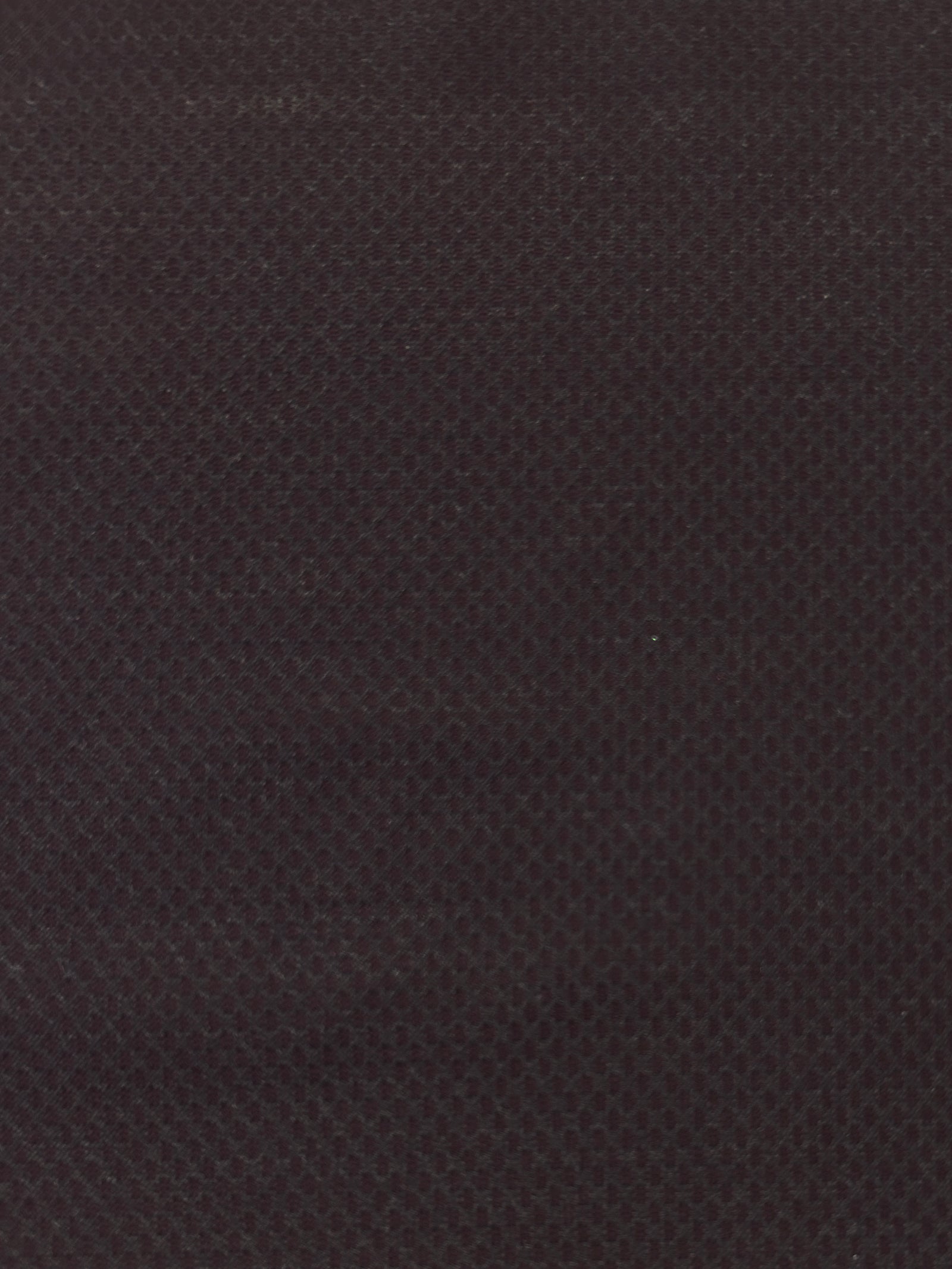 This fabric has a somewhat of a texture created by the jacquard weave. This fabric print resembles a art deco retro era. dark reds and browns.