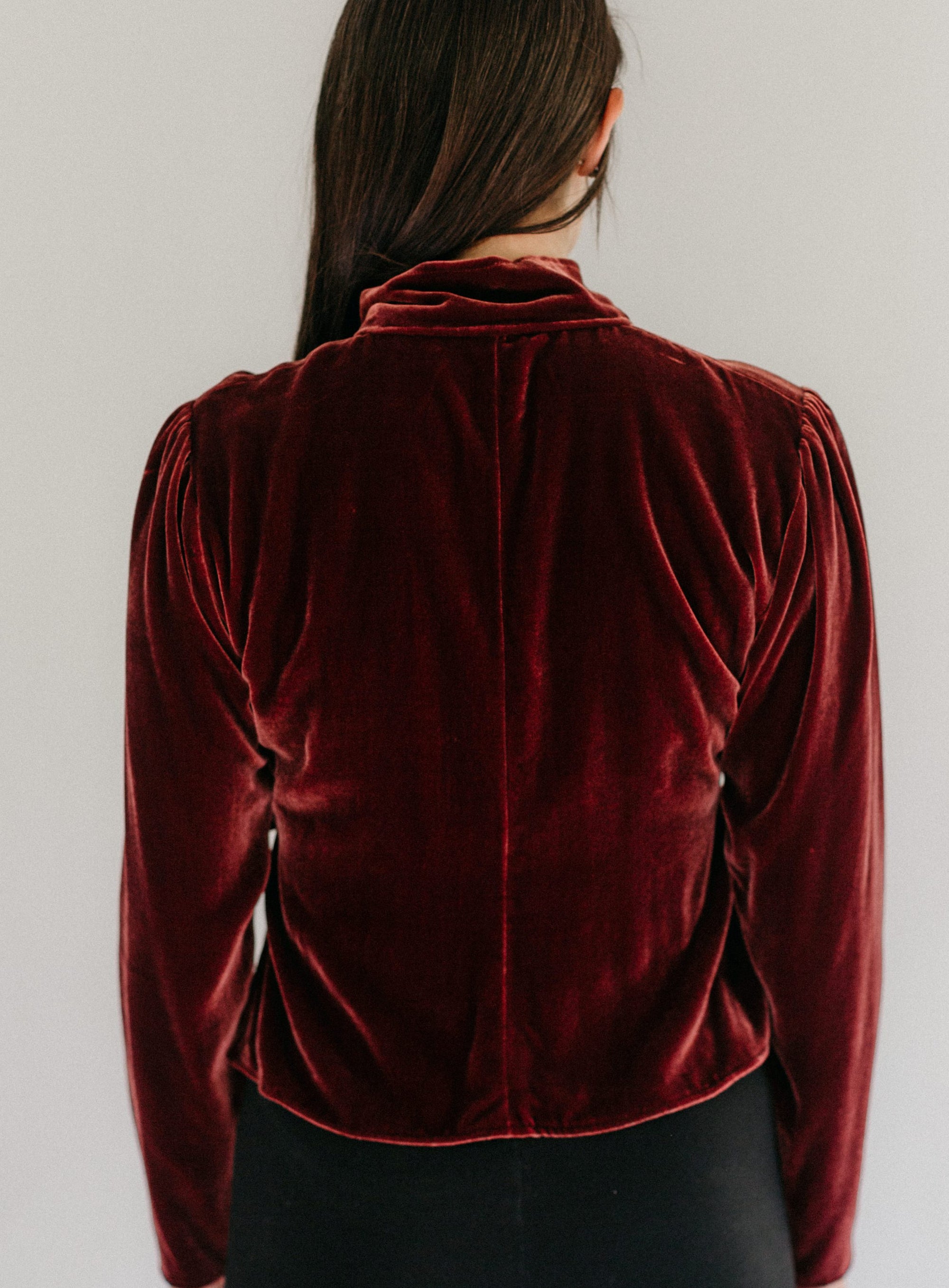 Back view of Nepali Blouse.  Shows seam down back and gathers at shoulders.