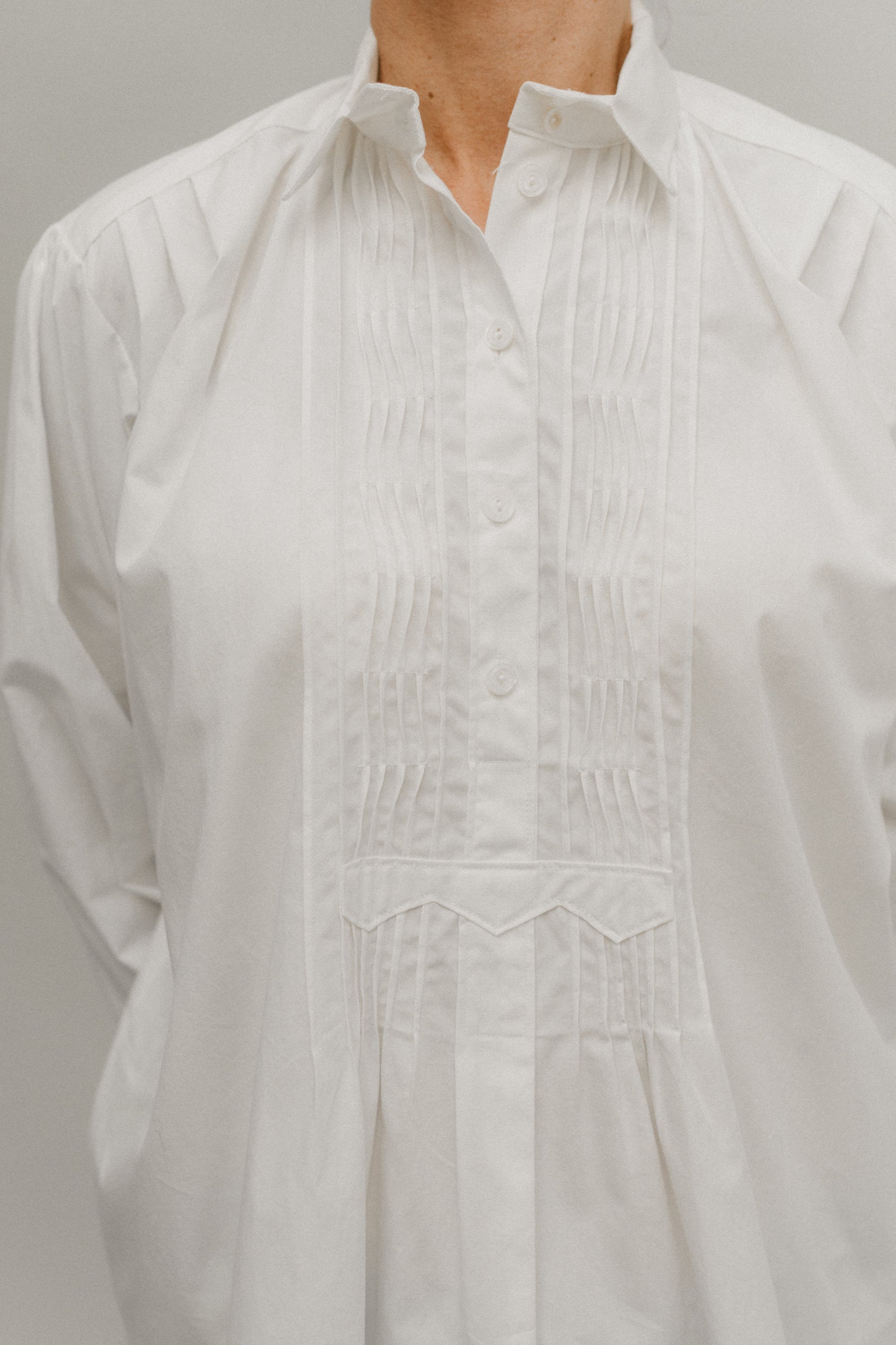 Close up of Croatian Shirt showing the front tucks and pleats.