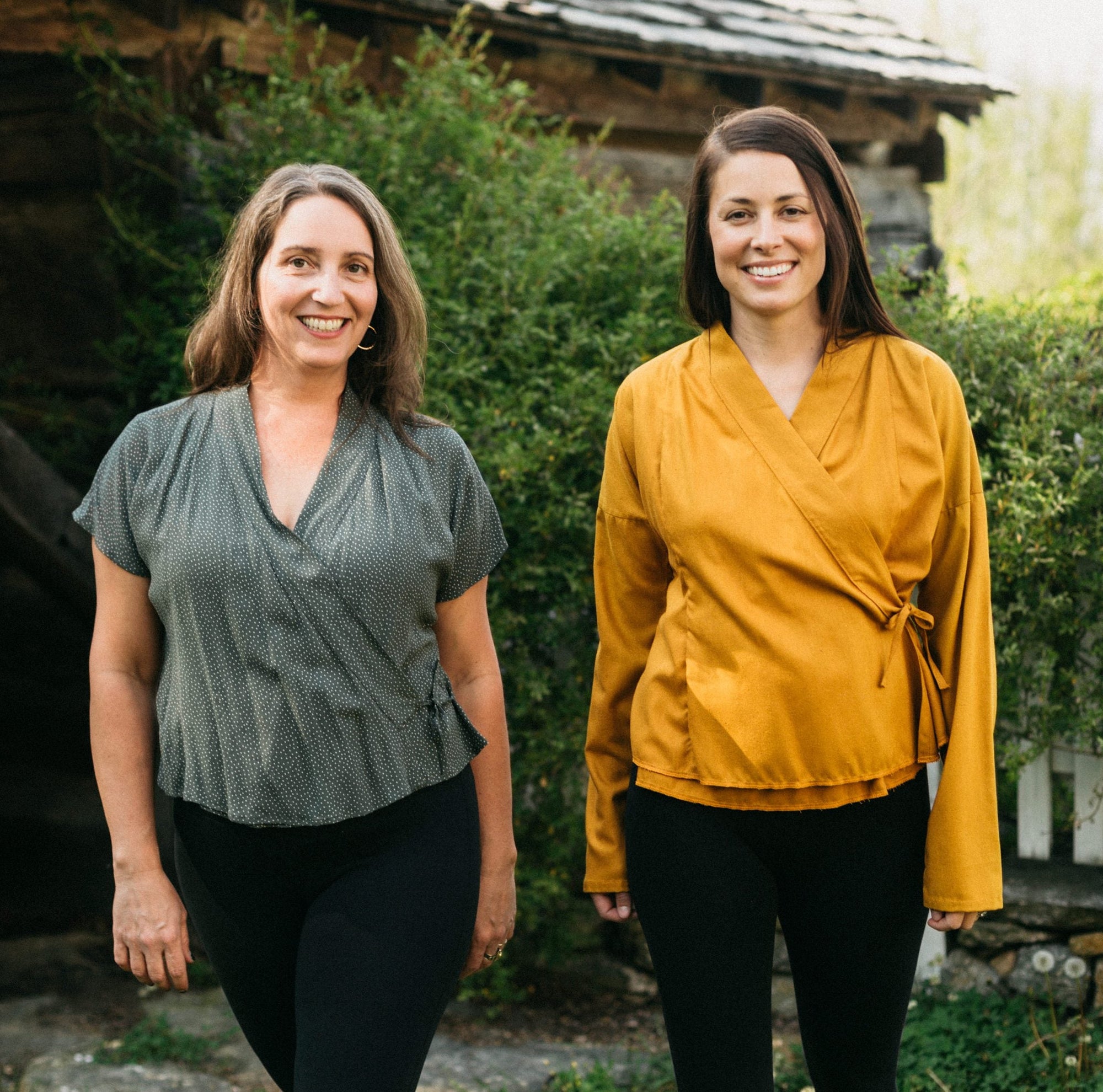 two models wearing Thai Blouse.  Model on left wears short sleeve adaptation and model on right wears standard long sleeve blouse.