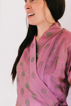 Photo of Thai Blouse neckline on model in front of white backdrop