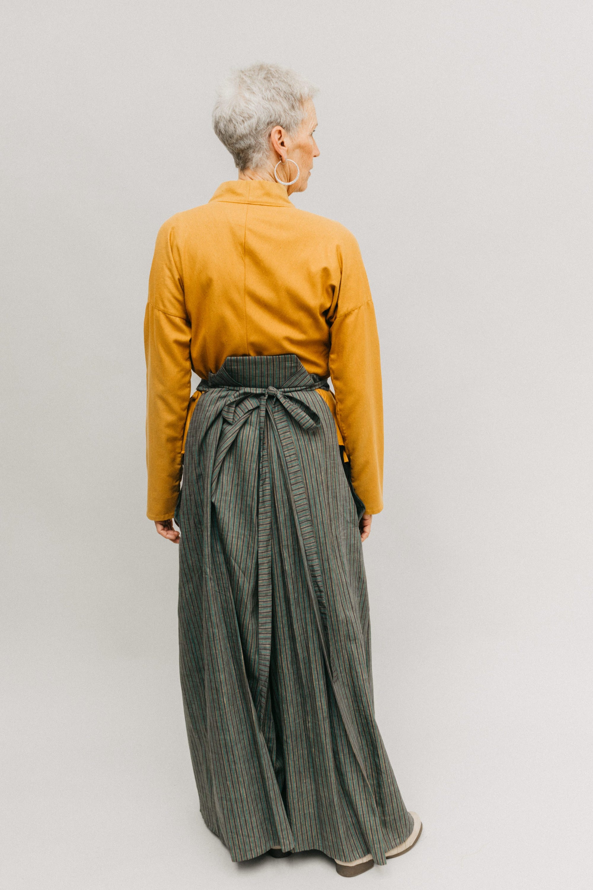 Photo of back view of the Hakama pants on model.